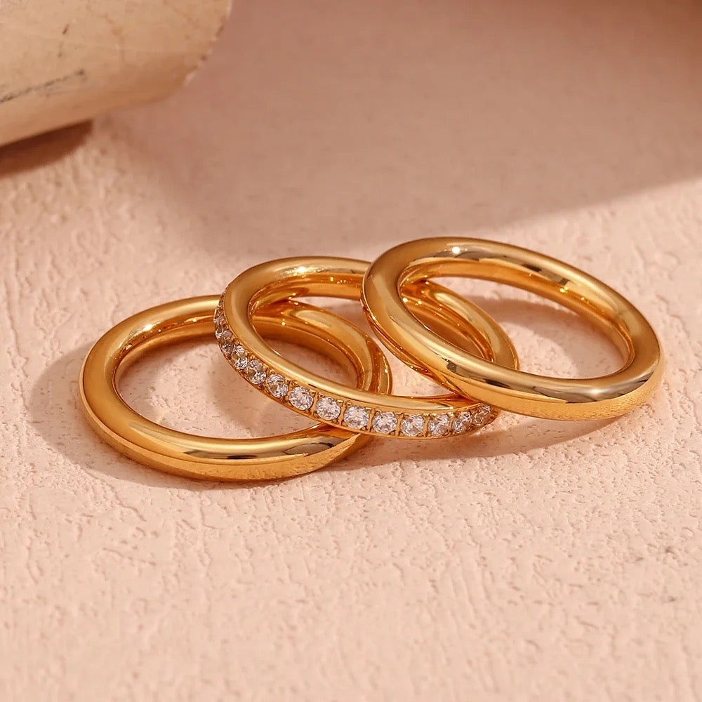 18kt gold plated set of 3 stackable rings, plain and zircon studded, caroline inaya accessories