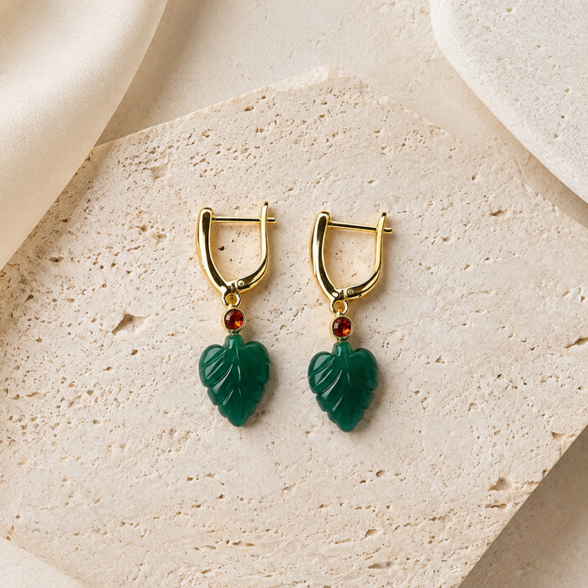 18kt gold plated v hoop earrings with carved natural stone leaf pendant