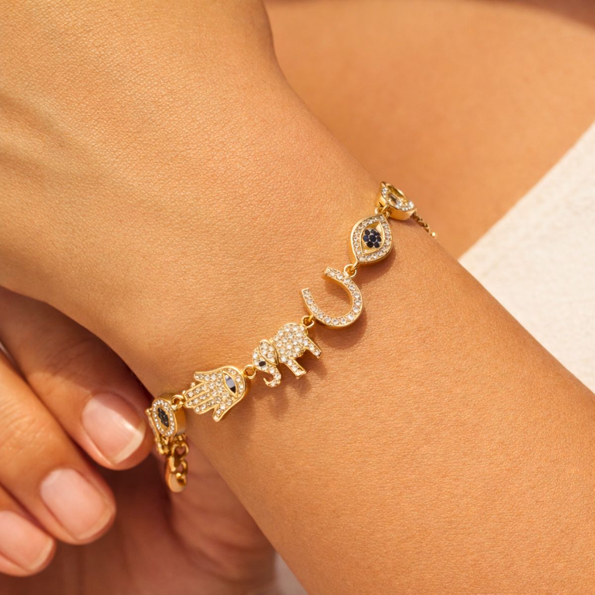 18kt gold plated multi charm talisman link bracelet, amaris