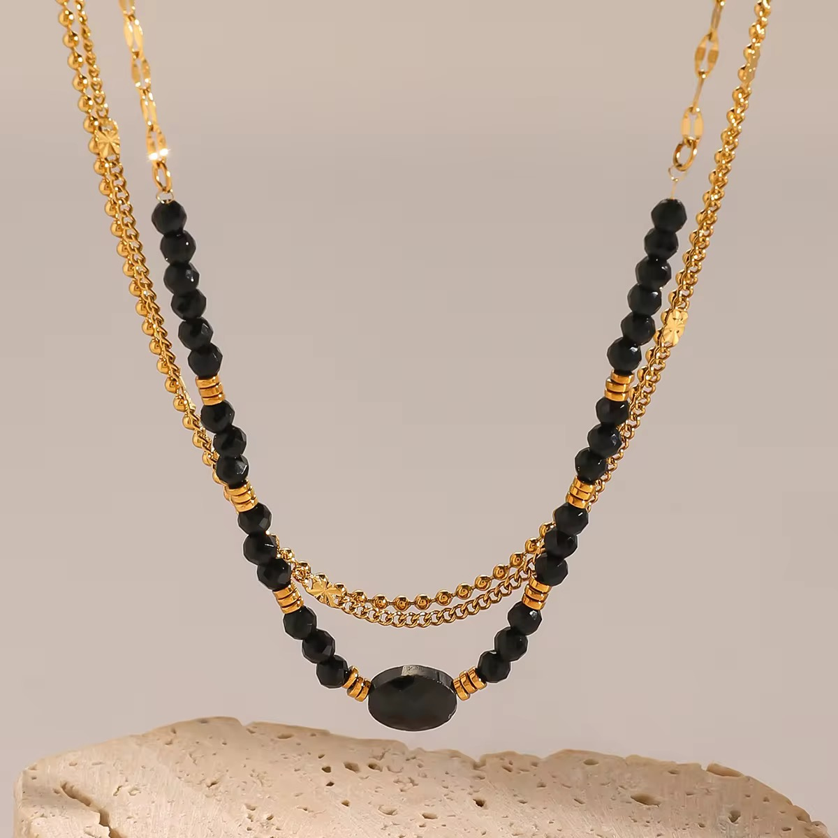 Kaleido necklace, 18kt gold plated stainless steel triple layered black crystal stone & beads necklace