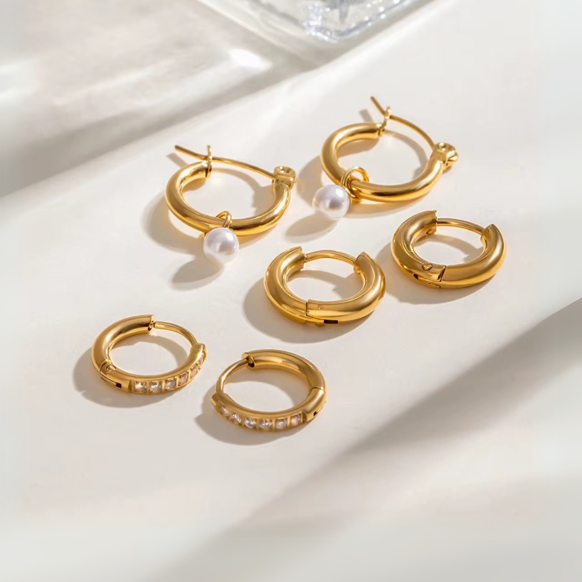 18kt gold plated set of three pearl and golden hoop waterproof earring set, ona