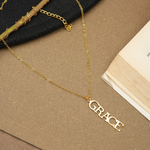 Load image into Gallery viewer, Inaya 18 KT Gold Plated Stainless Steel Capital Vertical Name Necklace
