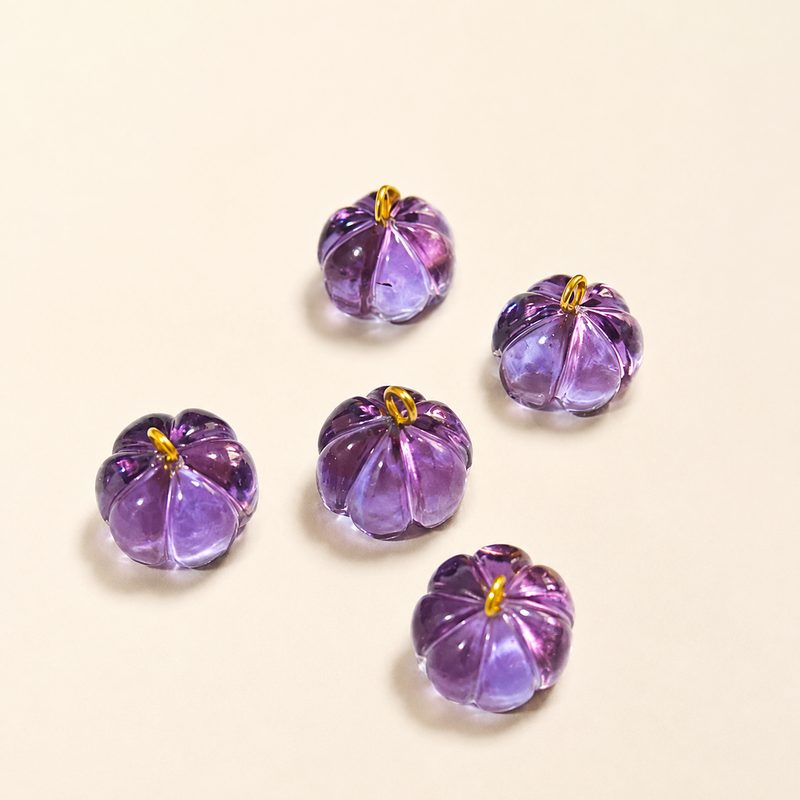 Carved in Stone Charms, the Maya Collection
