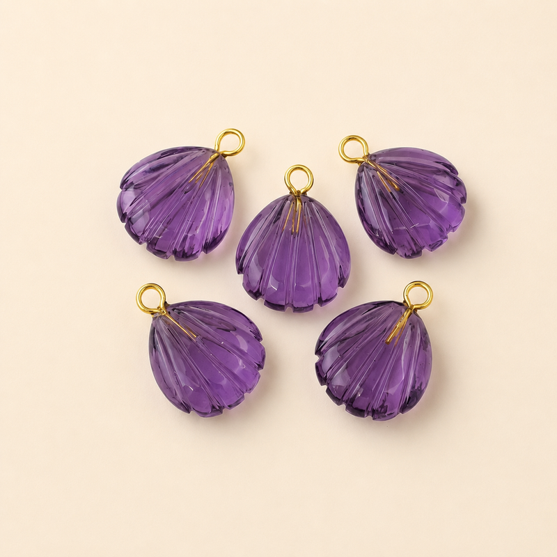 Carved in Stone Charms, the Maya Collection