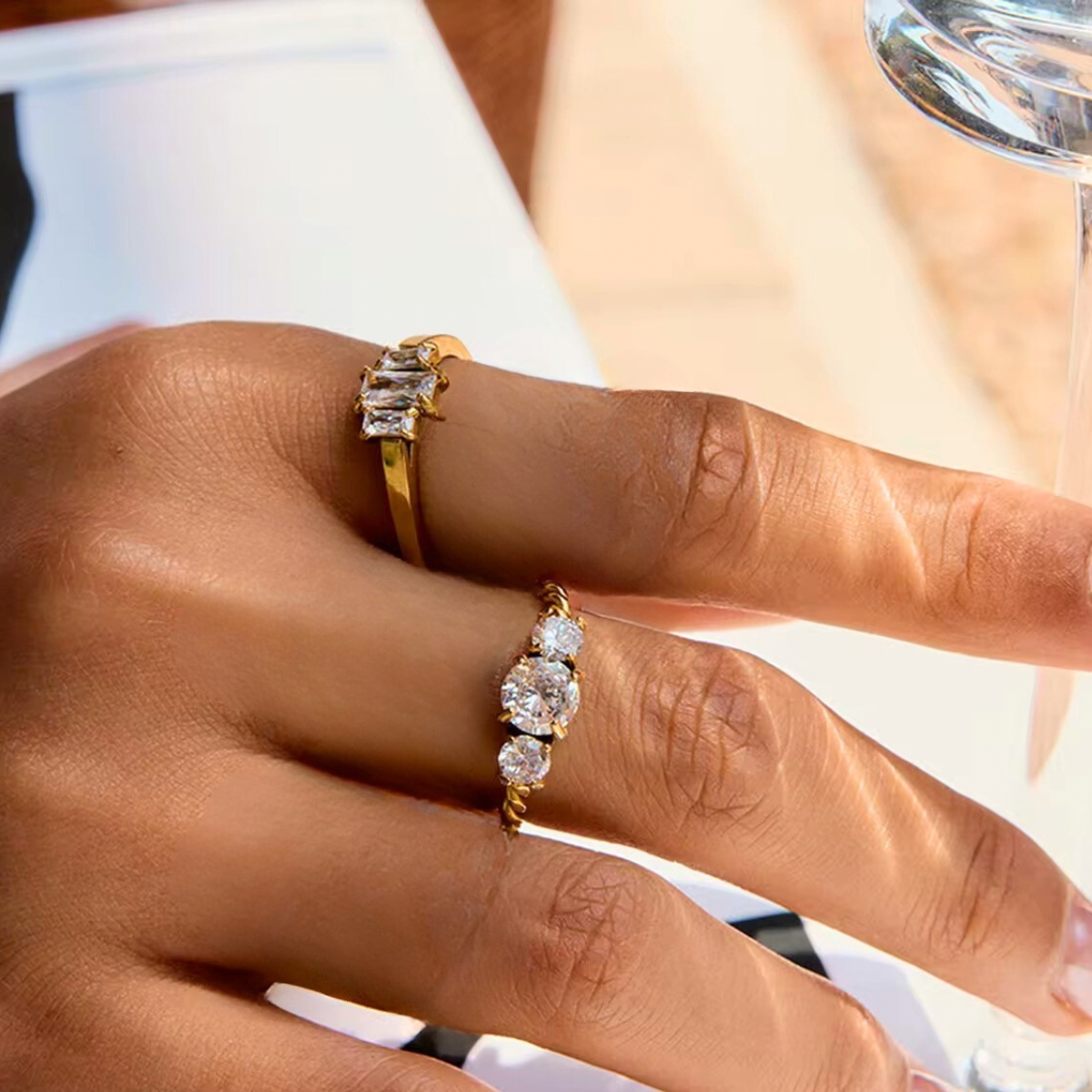 Inaya modern festive 18kt gold plated tripple baguette white zircon solitaire finger ring, isha