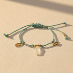 Load image into Gallery viewer, Knotty Bracelet, 18KT Gold Plated Stainless Steel Beach &amp; Fish Charm Threaded Bracelet
