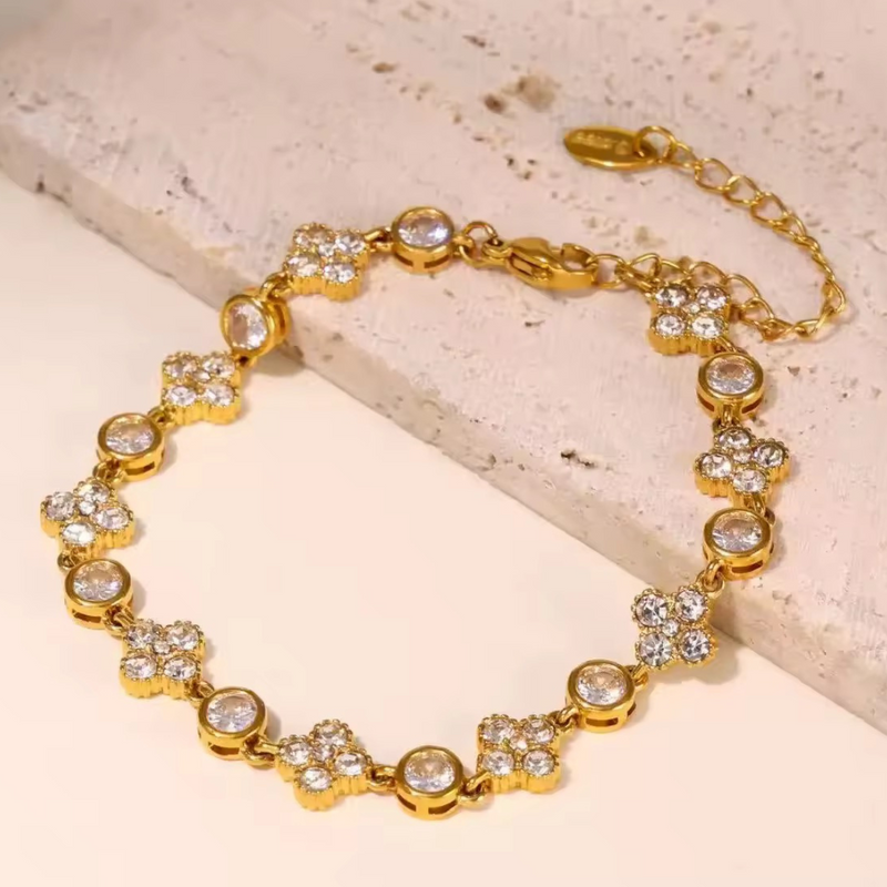 Inaya Modern Festive 18KT Gold Plated Vinatge White Zircon & Flower Bezel Tennis Bracelet, Sana