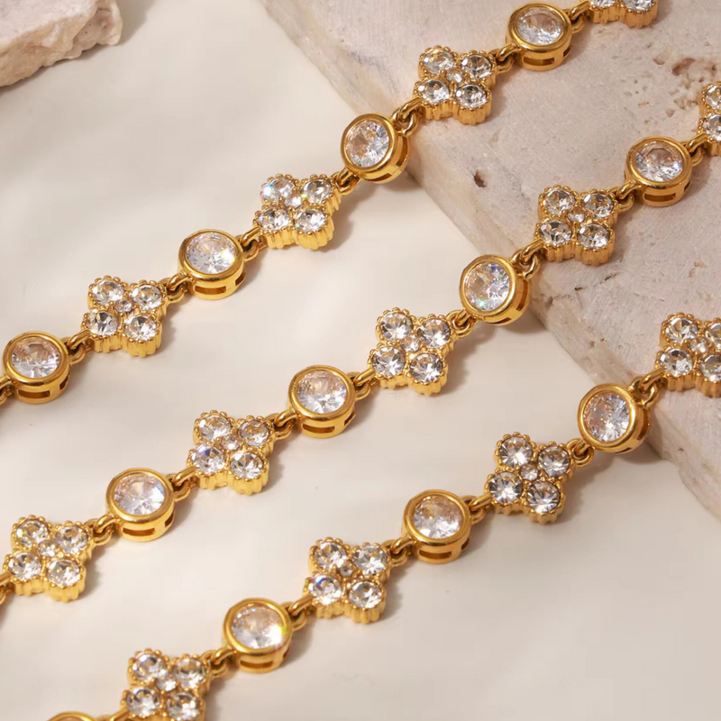 Inaya Modern Festive 18KT Gold Plated Vinatge White Zircon & Flower Bezel Tennis Bracelet, Sana