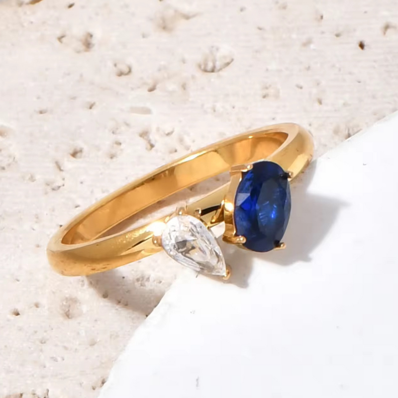 Inaya Modern Festive 18KT Gold Plated Toi et Moi Oval & Pear Shaped Blue Sapphire Solitaire Ring, You&Me