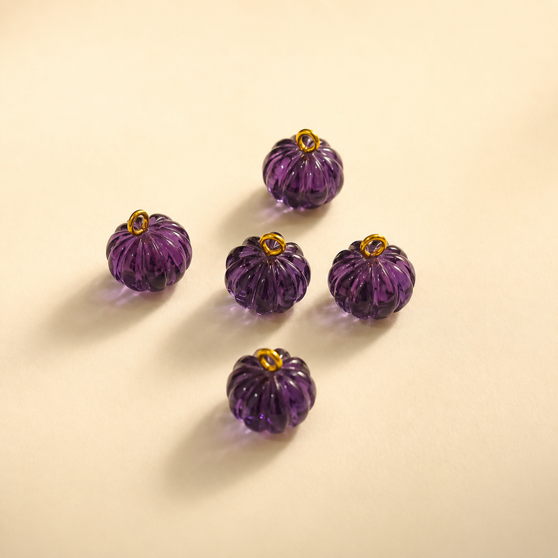 Carved in Stone Charms, the Maya Collection