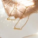 Load image into Gallery viewer, 22KT Gold Plated Cursive Brass name Necklace - Inaya Accessories