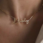 Load and play video in Gallery viewer, 22KT Gold Plated Cursive Brass name Necklace
