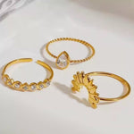 Load and play video in Gallery viewer, 18KT Gold Plated Set of 3 Stackable Water Droplet and Petal Stainless Steel Waterproof Rings, Tulip
