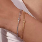 Load and play video in Gallery viewer, 18kt Gold Plated Minimalistic Knot Twisted Bracelet, Hermoine
